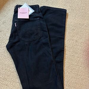 Jeckerson. Black pants.